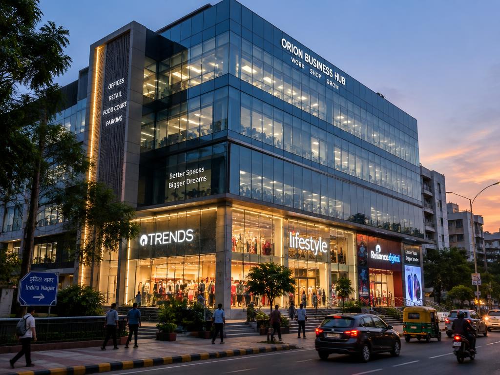 Glass commercial building at dusk